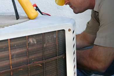 AC Systems of Jacksonville Repair, Man Fixing Old Air Conditioning Unit